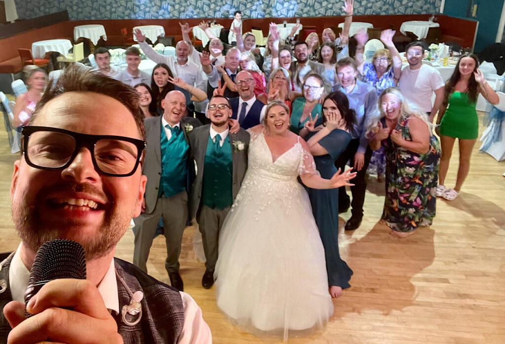 James Barlow with Wedding Party – The Club, Burtonwood, Warrington - James Barlow - Wedding Singer James Barlow with the wedding party at The Club in Burtonwood, Warrington, following live music and DJ entertainment at the wedding
